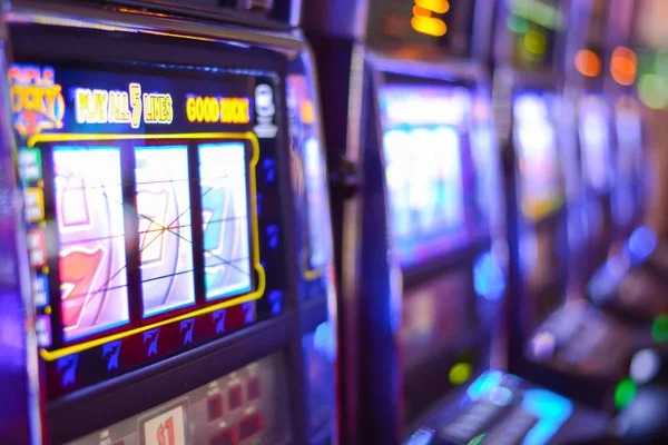 danajoker mobile app interface showing slot games and live tables
